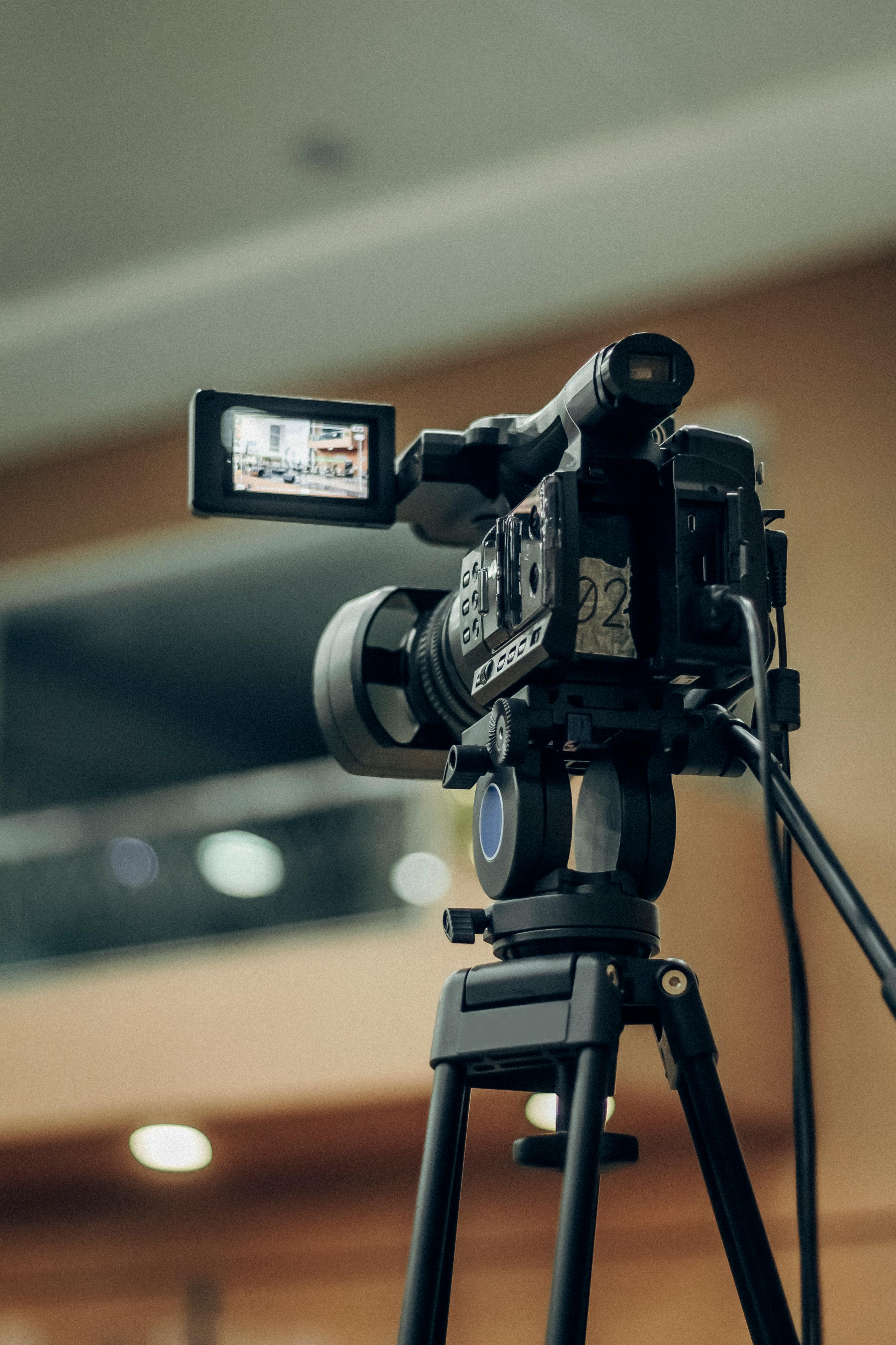 Picture of a video camera on a tri-pod